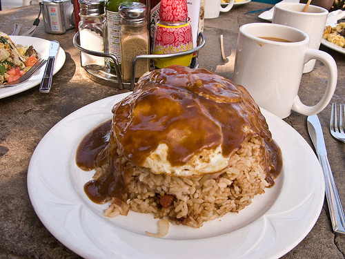 The Loco Moco A bed of rice topped with a large burger patty topped with a fried egg covered in brown gravy. (submitted by Malberry via flickr)