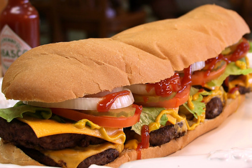 Double Cheeseburger Po-Boy A 14 inch po-boy filled with eight six ounce cheeseburger patties. (submitted by Mr. Boone via poboyexpress)